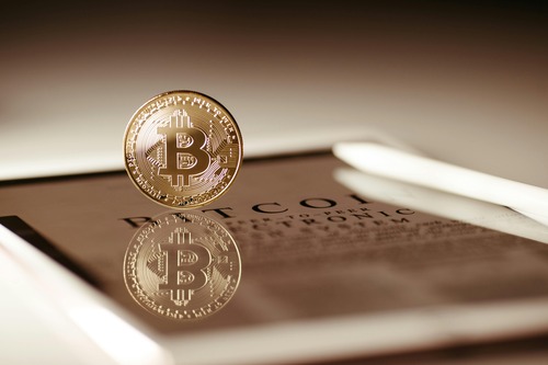 Person verifying a crypto wallet address before sending a transaction